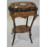 A 19th century walnut maple and ebonised jardinier