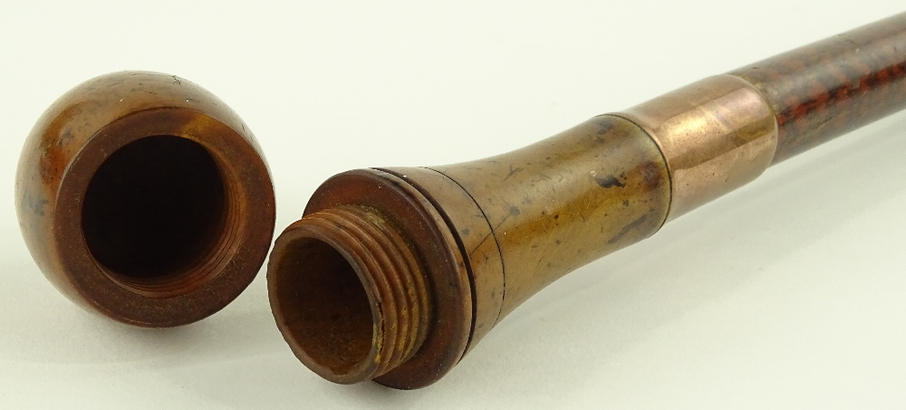 A 19th century walking cane with fruit wood top an