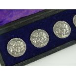 A cased set of 6 silver buttons, by Levi & Salaman