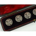 A cased set of 6 silver buttons, by Cornelius Deso