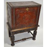 An unusual embossed leather covered side cabinet,
