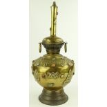 An Indian engraved brass lamp base, with inset pol