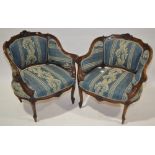 Pair of French carved beech framed upholstered tub