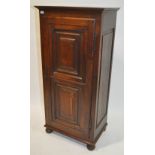 An Antique French panelled oak hall cupboard, fiel