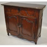 An 18th century continental fruitwood cupboard, ri