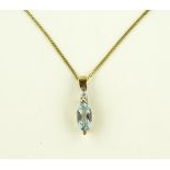 A 9ct gold marquise cut aquamarine and diamond set