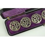 A cased set of 6 silver buttons, by Henry Matthews