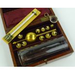 A Victorian hydrometer in mahogany case, case widt