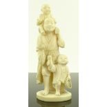 A Japanese Meiji period carved ivory figure, man w