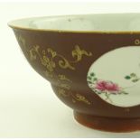 A Chinese porcelain bowl, hand painted floral pane