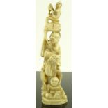 A Japanese Meiji period marine ivory carving, grou