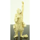 A Japanese Meiji period ivory carving, figure with