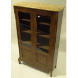 A French kingwood 2-door bookcase, shaped glazed p