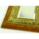 A pair of Victorian relief embossed brass framed w