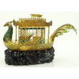 A Chinese unmarked silver gilt mythological bird d