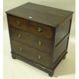 An 18th century joined oak chest of 3 long drawers