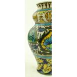 A Middle Eastern pottery double gourd vase, hand p