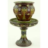 A Doulton Lambeth Stoneware jardiniere on stand, p