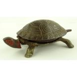 A Victorian tortoise design cast-iron clockwork ta