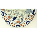 A Middle Eastern porcelain plate, hand painted sty