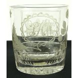 A 19th century glass tumbler with etched panel dep