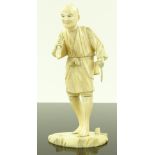 A Japanese Meiji period sectional ivory figure, du