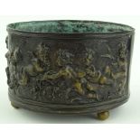 A relief moulded patinated bronze jardiniere with