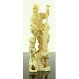 A Japanese Meiji period ivory carving, man and boy