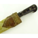 A Middle Eastern horn handled dagger, original bra