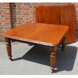 A Victorian mahogany wind-out dining table, moulde