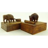 A pair of Ceylonese wooden boxes with carved eleph