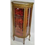 A French walnut vitrine cabinet circa 1900, shaped