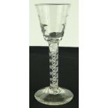 An 18th century cordial glass with milk twist stem