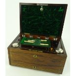 A Victorian rosewood travelling toilet box, inlaid