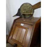 A Victorian walnut coal bin with brass handle and