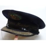 A railway Station Master's peaked cap dated 1960