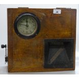 An Antique oak-cased clocking-in machine by Blick