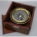 A small brass gimballed Ship's Compass in wooden c