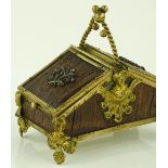 A small ornate Victorian gilt brass, double-lidded