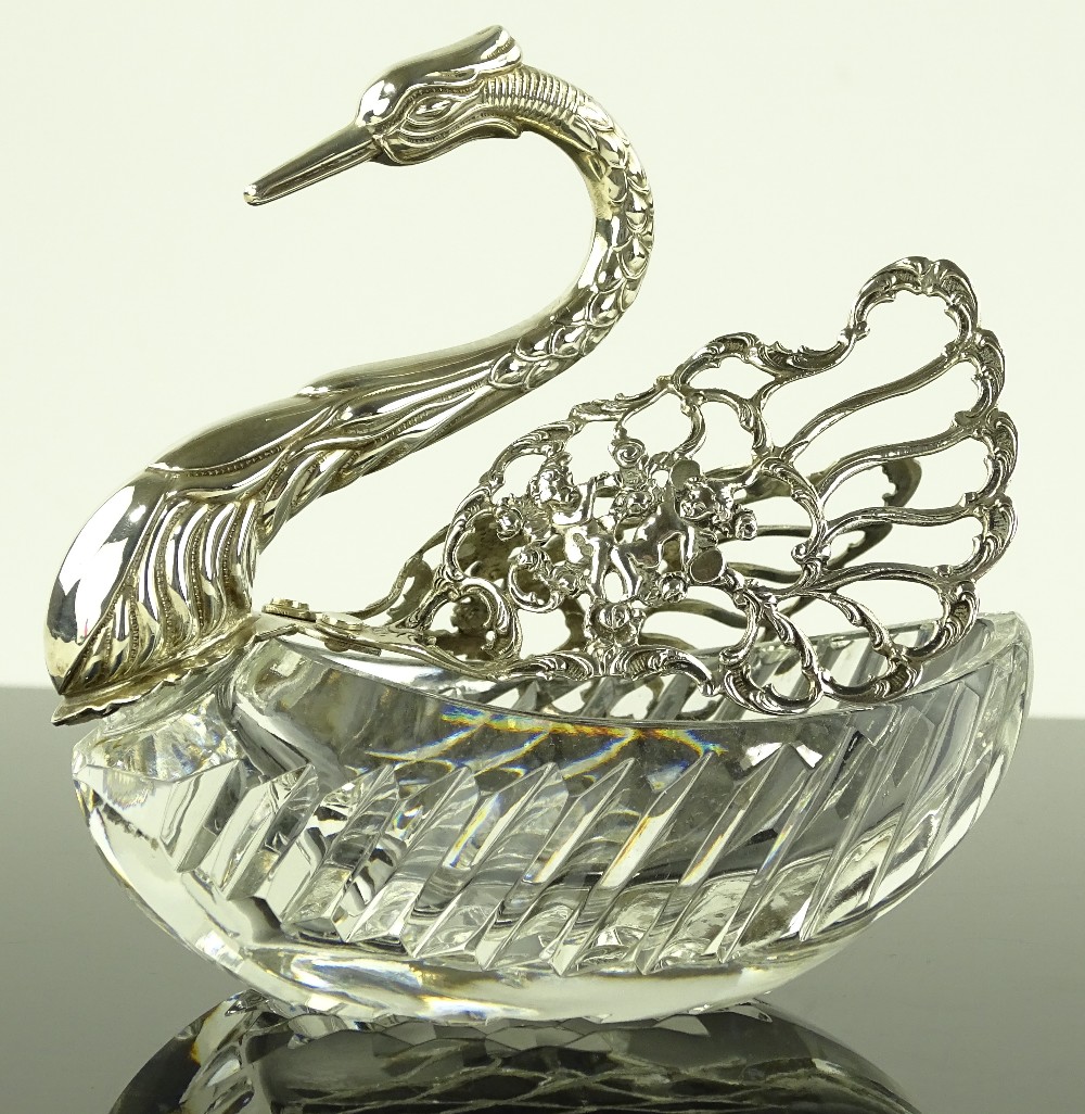 A cut-glass and silver swan design toothpick holde