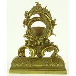 An ornate Victorian cast-brass pocket watch stand,