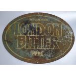 A Vintage Watney's London Bitter enamel advertisin