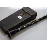 A Vintage rosewood and nickel plate clarinet, stam