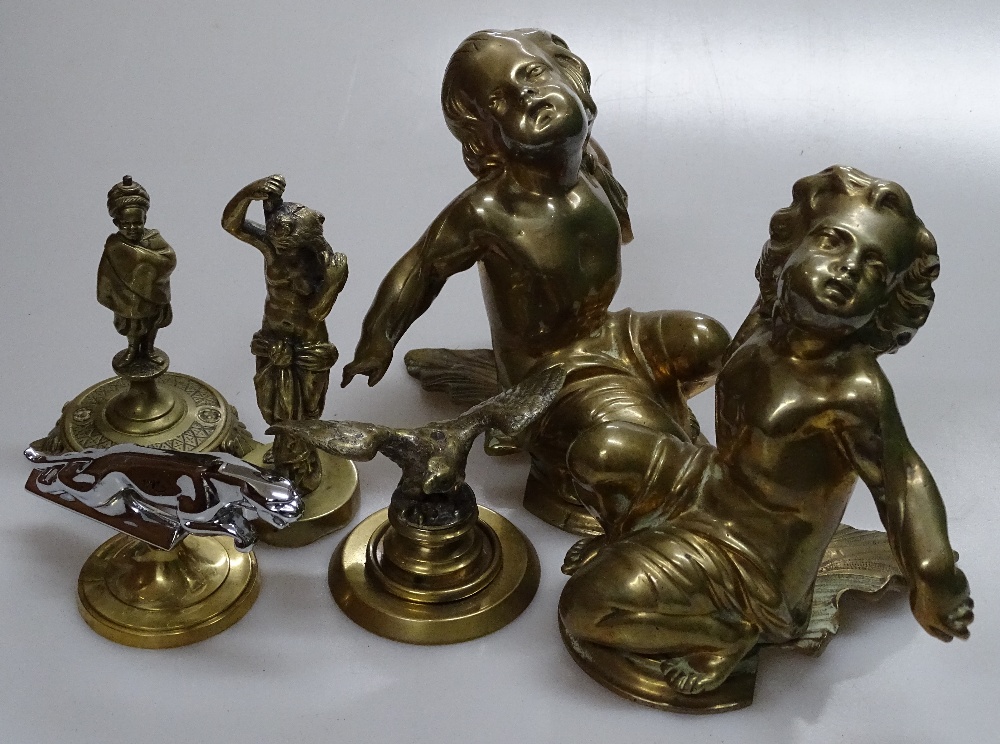 Various brass ornaments, a Jaguar car mascot etc