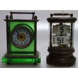 A green glass and nickel plate carriage clock, and