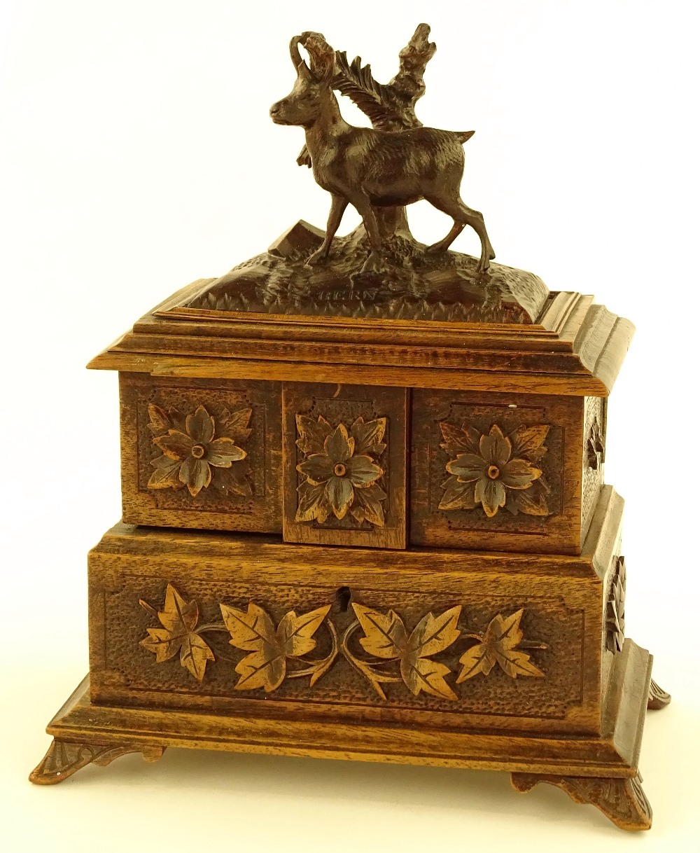 A 19th century Black Forest carved wood jewel box