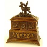 A 19th century Black Forest carved wood jewel box