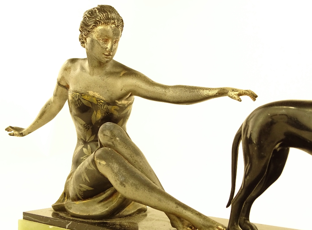 An Art Deco patinated spelter sculpture, woman and - Bild 3 aus 3