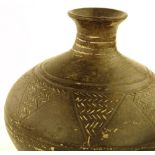 An Ancient Greek pottery vase with incised geometr