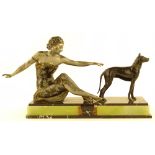 An Art Deco patinated spelter sculpture, woman and